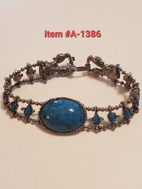 1 Turquoise Silver Bracelet, item # 1386 , wt. 25 grams.